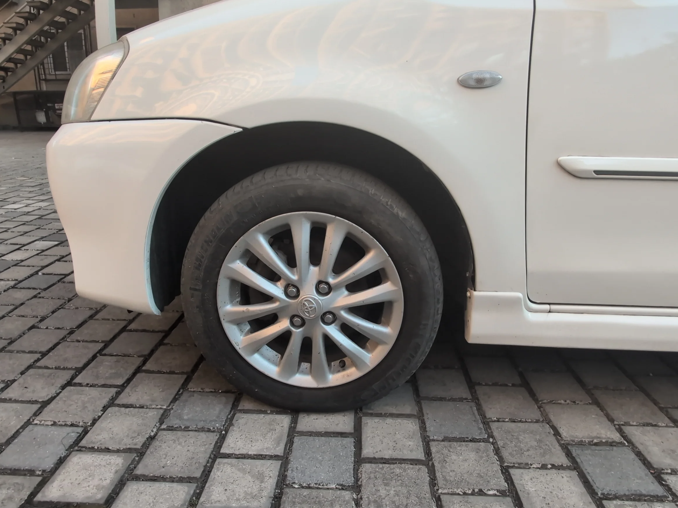 2011 Toyota Etios VX, Petrol, Manual, 7,56,363 km, Left Front Wheel