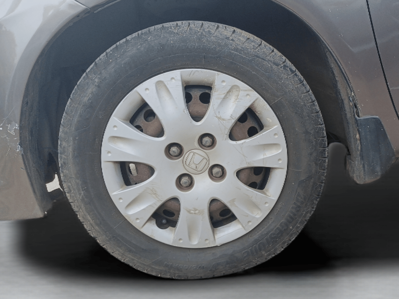 2014 Honda Brio S MT, Petrol, Manual, 1,04,080 km, Left Front Wheel